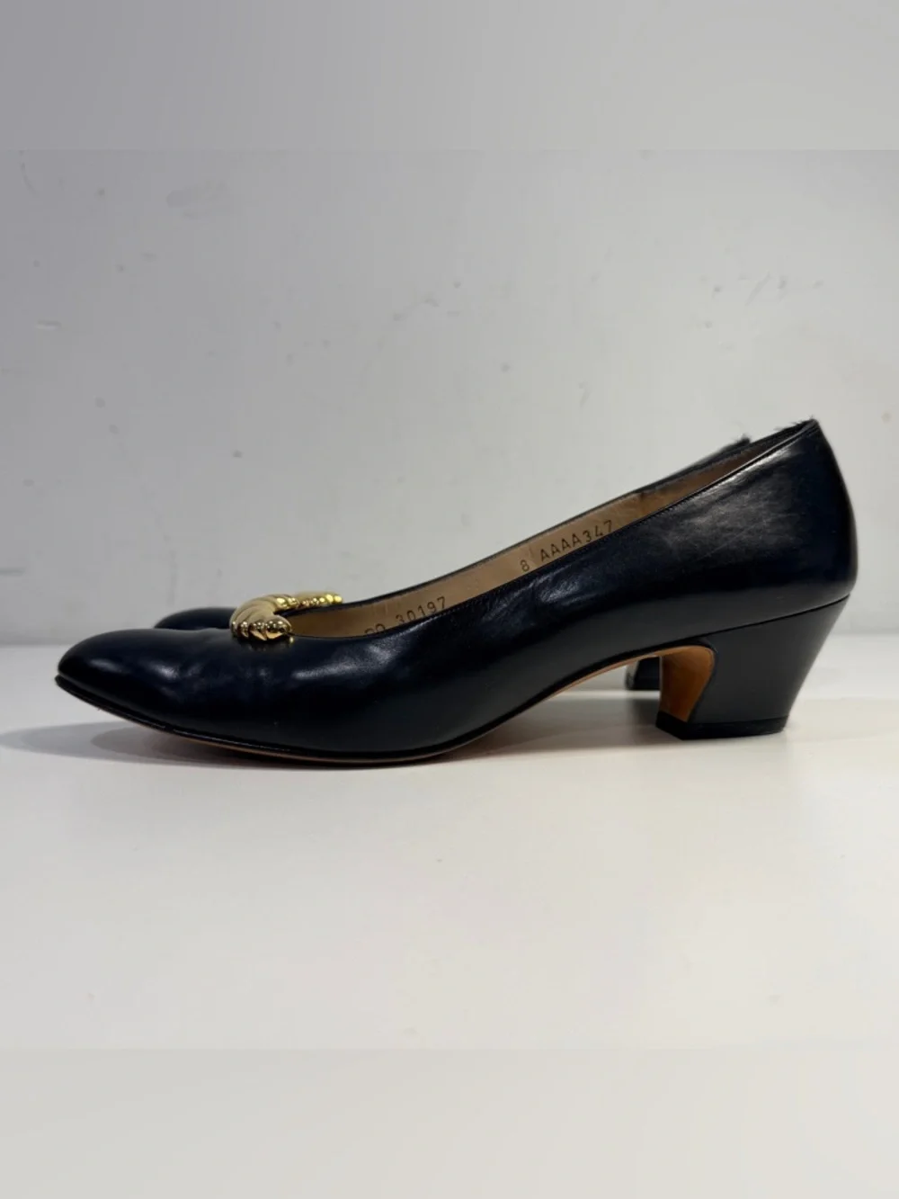 Salvatore Ferragamo Black Leather Flats with Gold Twist Accente